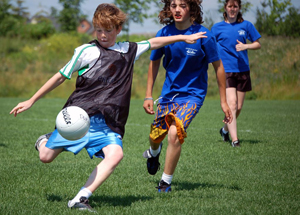 PLAYING SOCCER